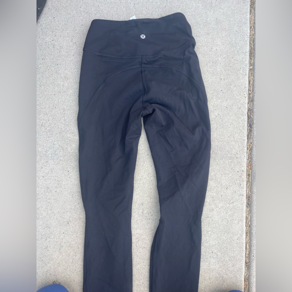 Rare lululemon black legging with slits in knees. Size 4